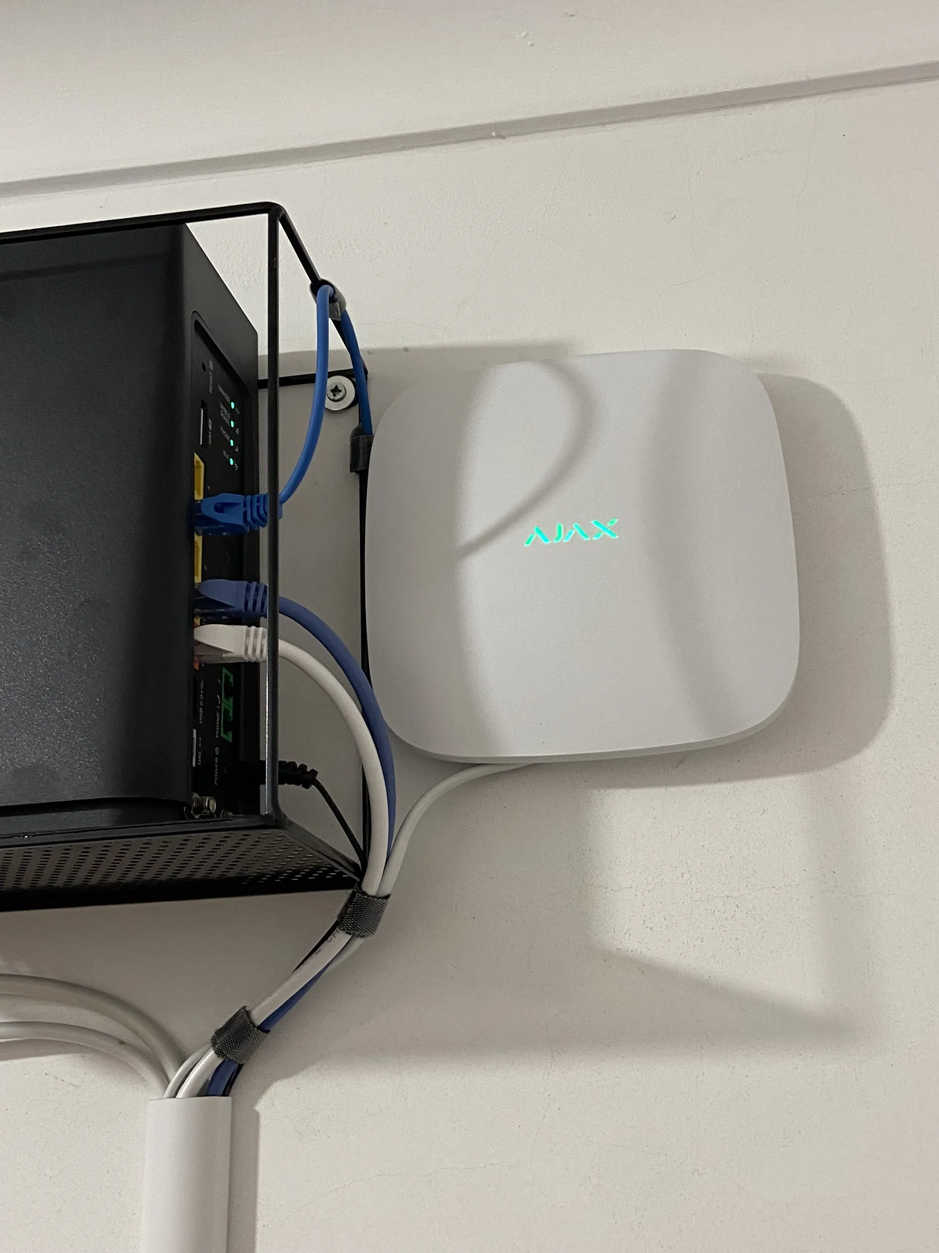 Alarm system hub installed by Great White Security